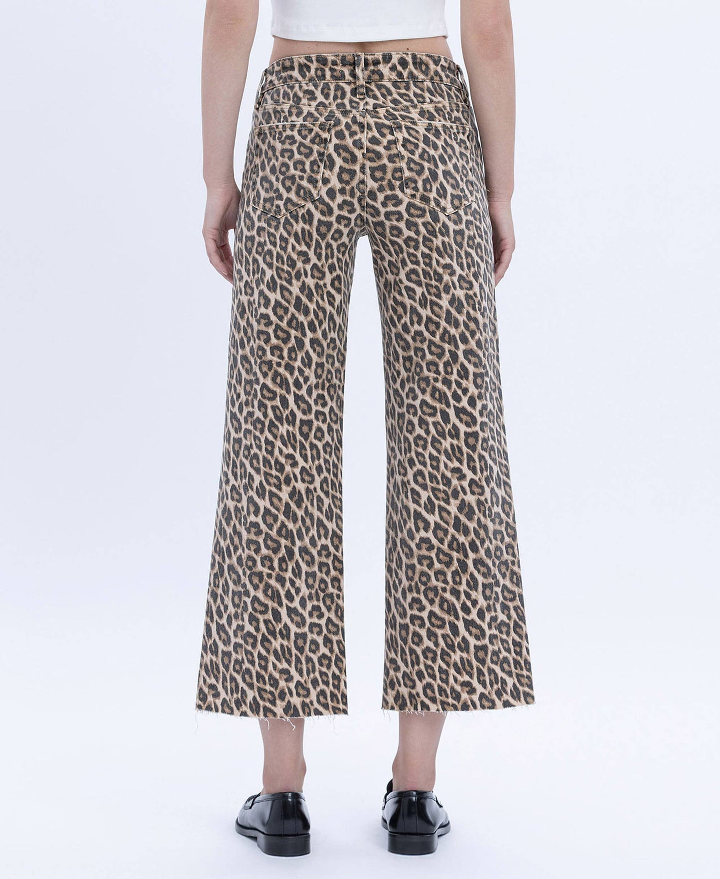Faded Cheetah Girl Wide Leg High Rise Raw Hem Jean
