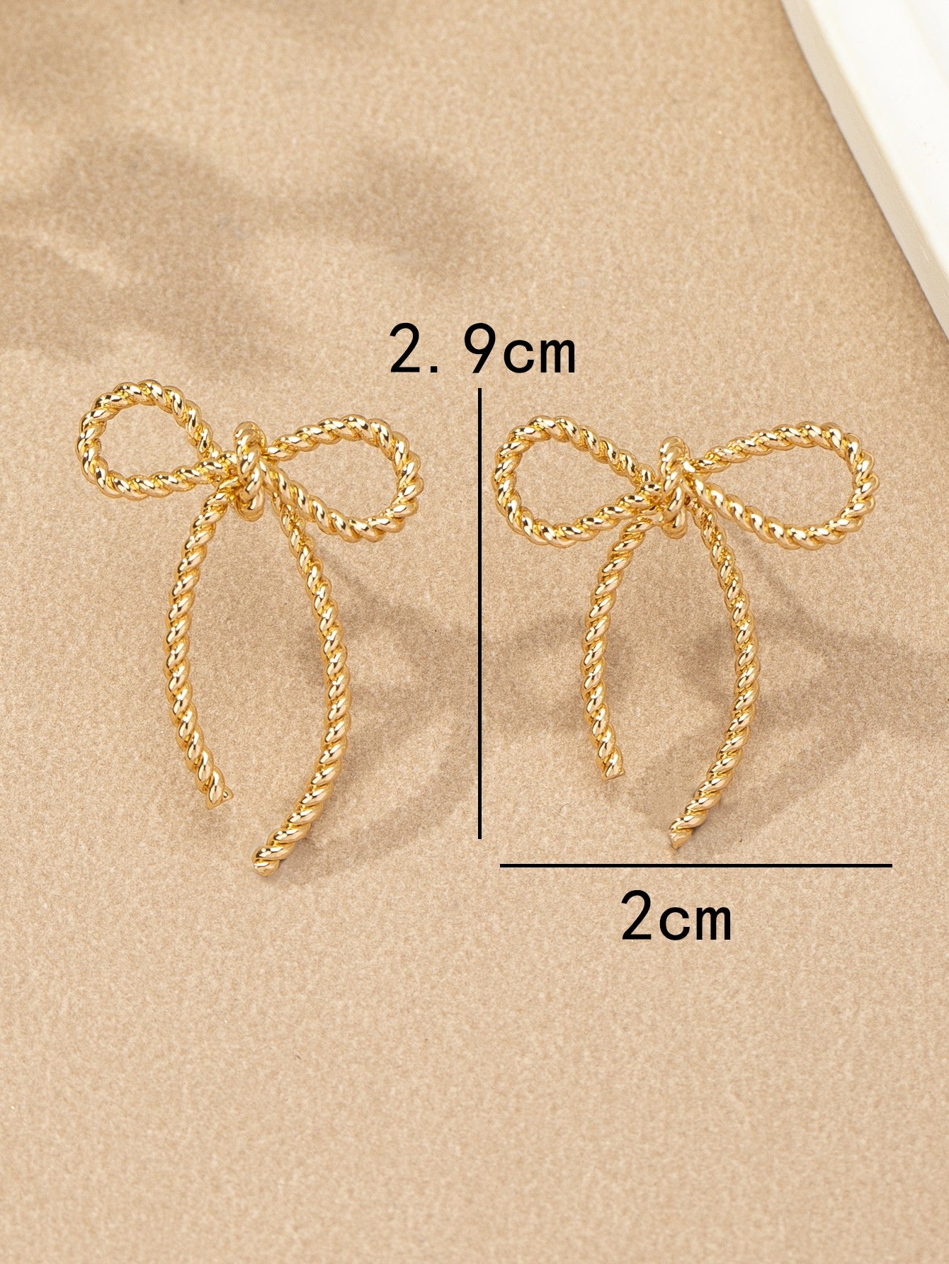 Textured bow earrings