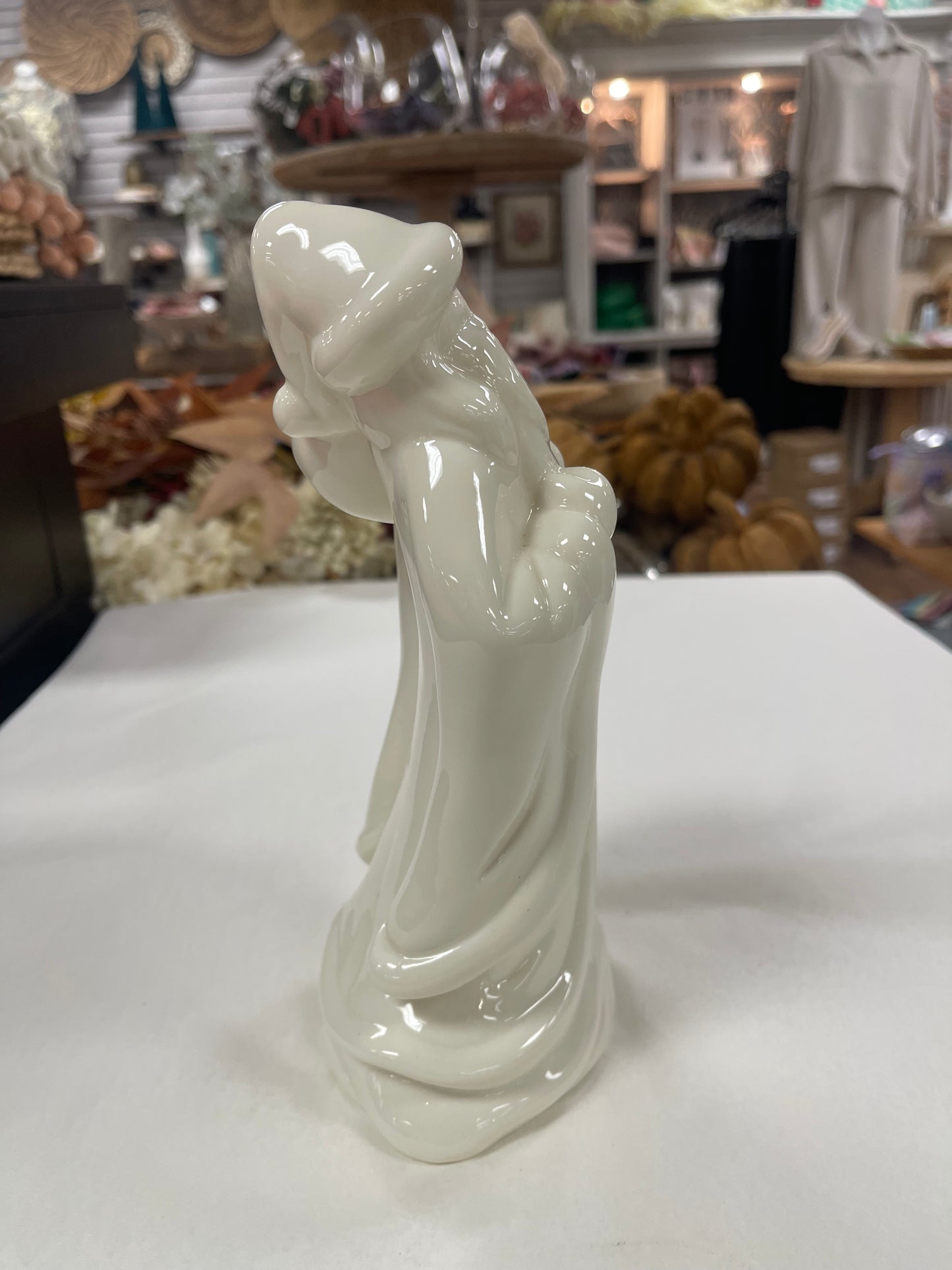 Porcelain Santa Carrying Bag Figurine 9”