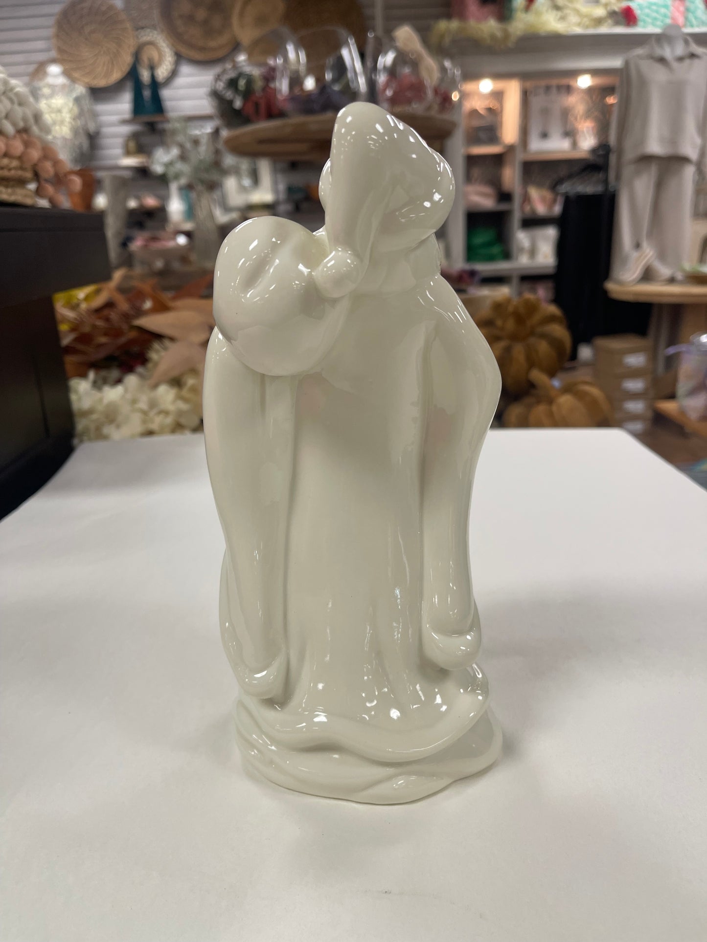 Porcelain Santa Carrying Bag Figurine 9”