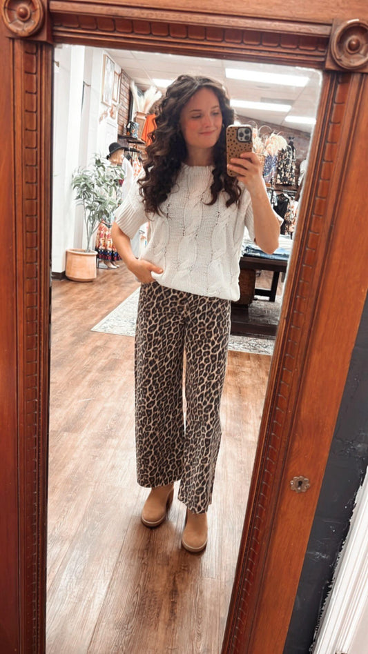 Faded Cheetah Girl Wide Leg High Rise Raw Hem Jean